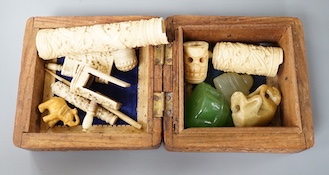 A group of 19th century ivory carvings, glass buddha, monkey etc